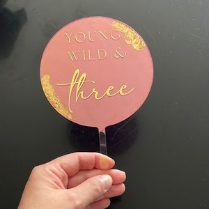 “Young, wild and three” acrylic cake topper